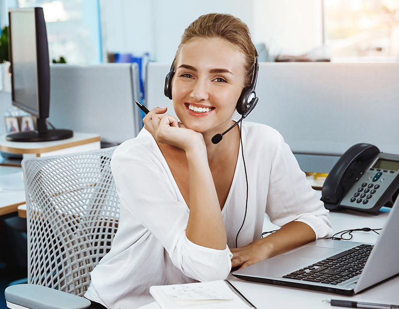 Young beautiful female support phone operator speaking, consulting, office background.